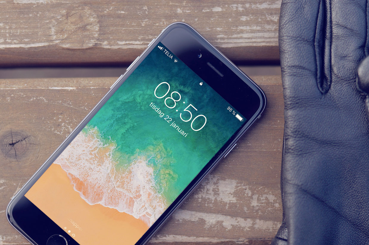 En mobiltelefon och en handske.